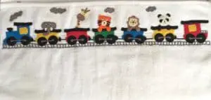 Finished crochet train series on a towel