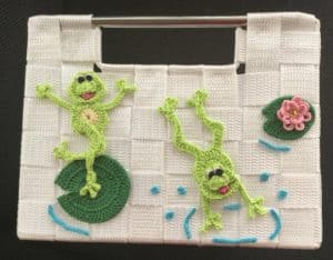 Finished crochet frog basket, side view
