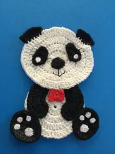 Finished crochet panda with bowtie, portrait