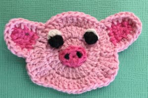 Crochet pig face with eyes