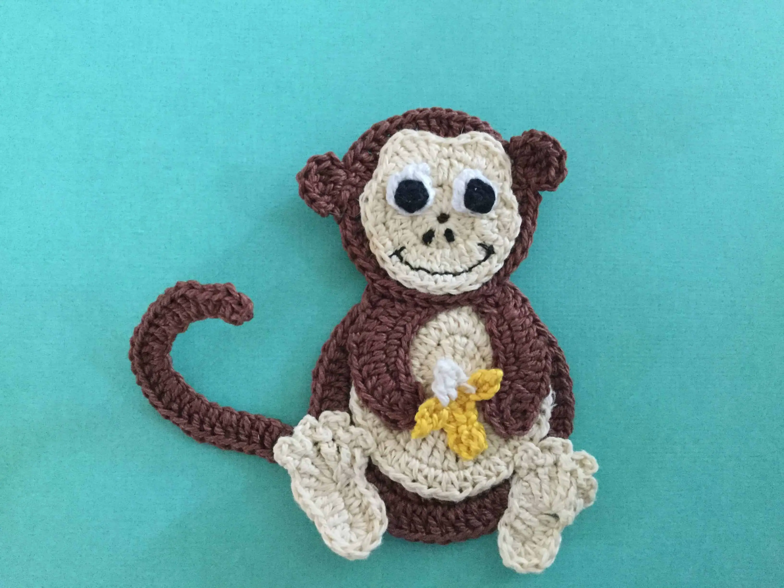 Finished crochet monkey landscape