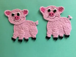 Finished crochet pig group landscape