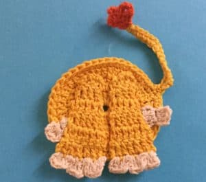 Crochet sitting lion body with front legs