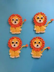 Finished crochet sitting lion group portrait