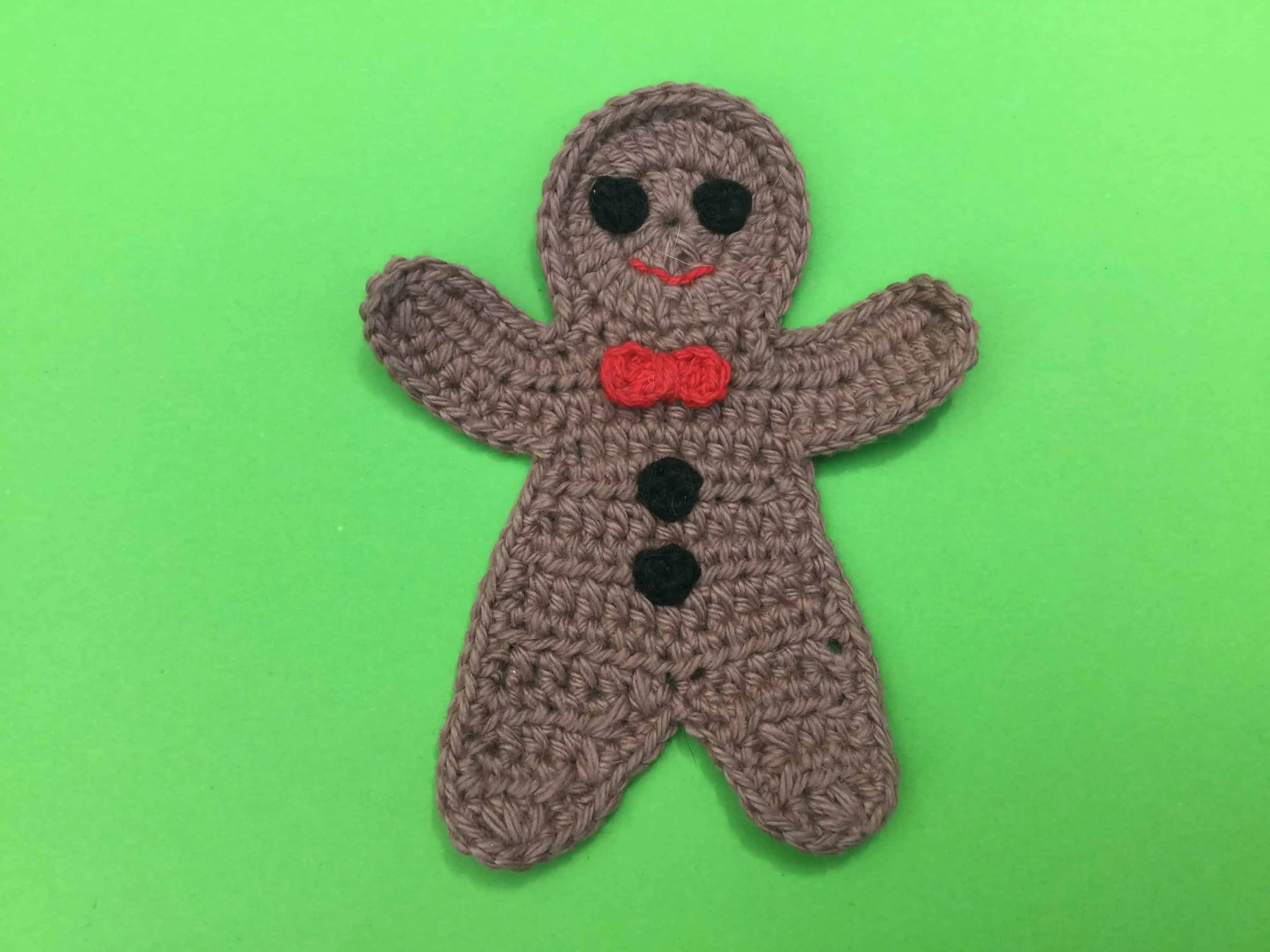 Finished crochet gingerbread man landscape