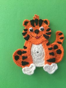 Finished crochet crouching tiger portrait