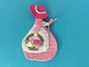Finished crochet girl with basket landscape