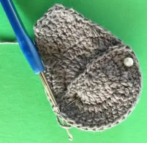 Crochet kangaroo pinned pouch to body