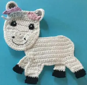 Crochet unicorn body with side head piece