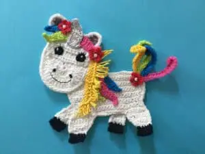 Finished crochet unicorn bright landscape