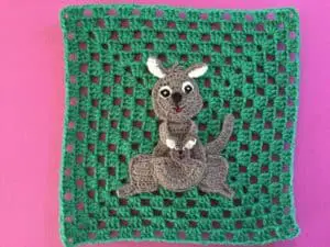 Finished crochet granny square with kangaroo landscape