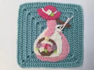 Granny square contest girl with a basket of flowers