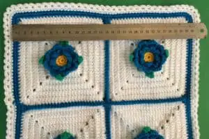 Crochet flower cushion measuring for cushion