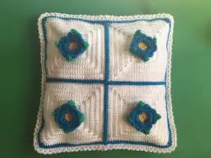 Finished crochet flower cushion white landscape