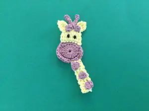 Finished crochet giraffe head landscape