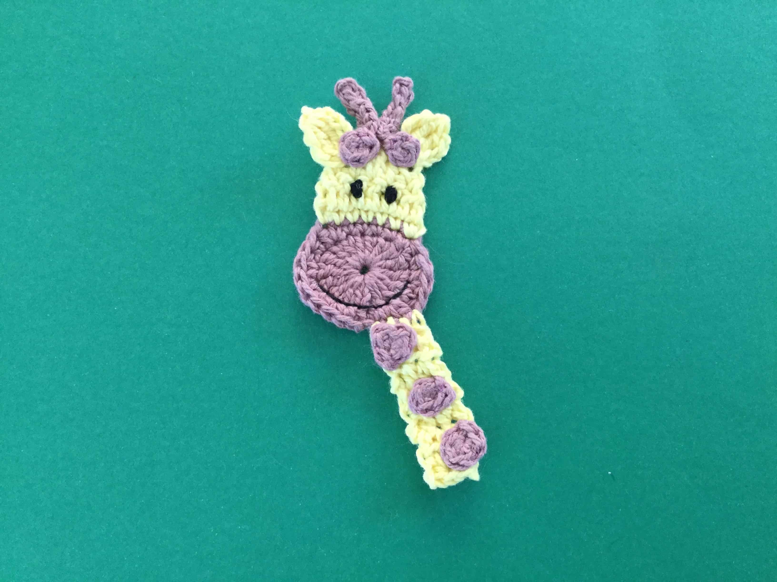 Finished crochet giraffe head landscape