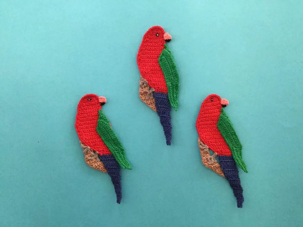 Finished crochet king parrot group landscape