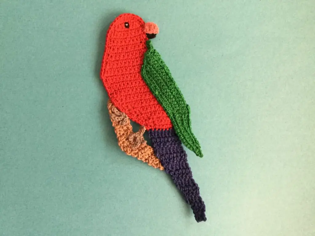 Finished crochet king parrot landscape