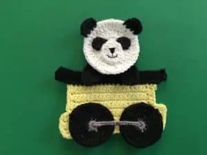 Finished crochet panda head landscape