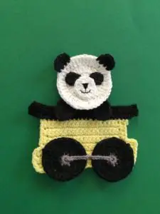 Finished crochet panda head portrait