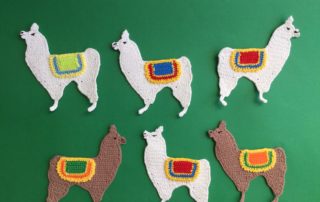 Finished crochet llama group landscape 2