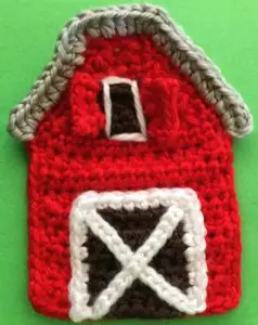 Crochet barn barn front with small window outlined