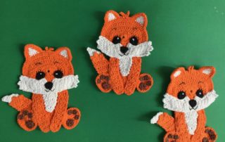 Finished crochet baby fox group landscape