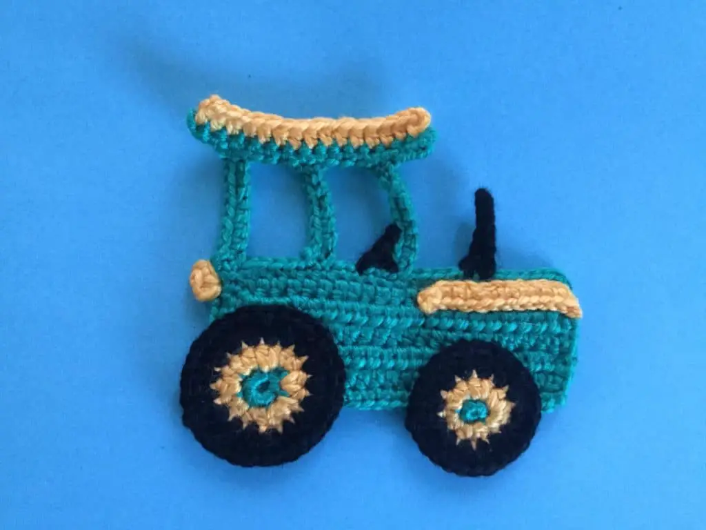 Finished crochet tractor landscape 1
