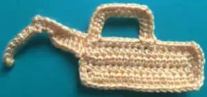 Crochet digger back end arm