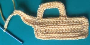 Crochet digger back end arm chain