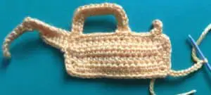 Crochet digger front arm chain