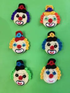 Finished crochet clown with tophat group portrait