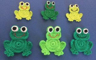 Finished crochet frog group landscape