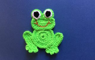 Finished crochet frog landscape