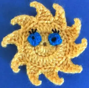 Crochet sun body with eyelashes