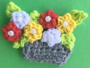 Crochet bicycle applique basket with flowers and leaves