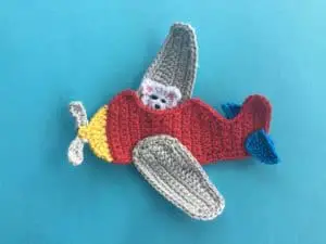 Finished crochet airplane applique landscape