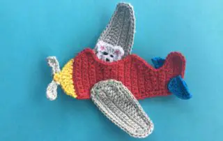 Finished crochet airplane applique landscape