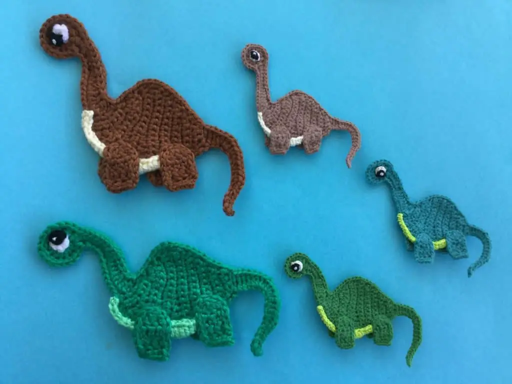 Finished crochet dinosaur group landscape