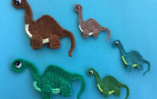 Finished crochet dinosaur group landscape