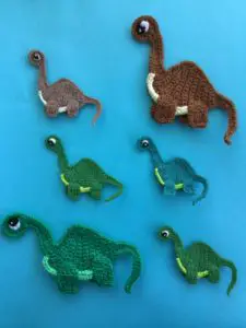 Finished dinosaur crochet applique pattern group portrait