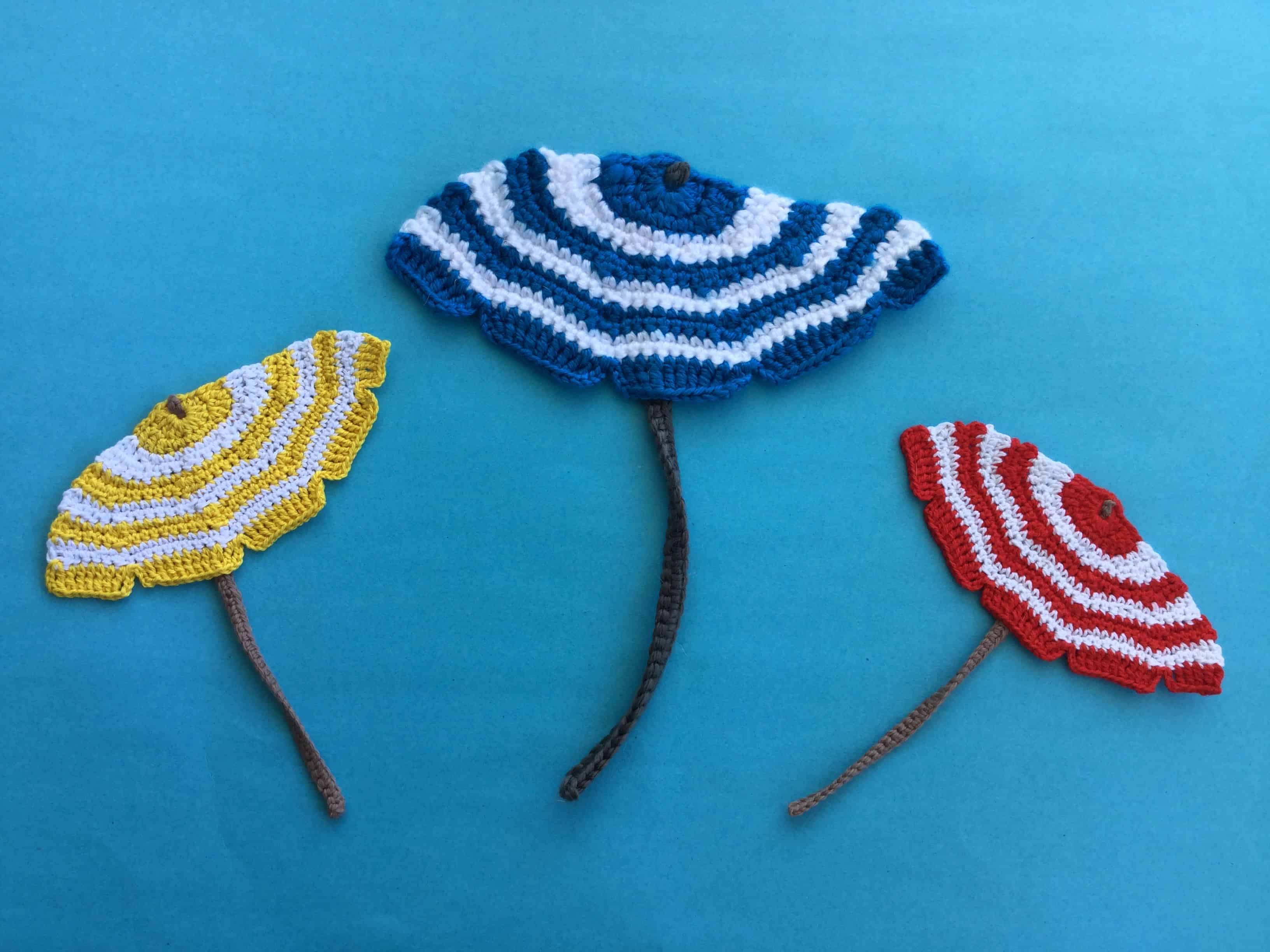 Finished crochet beach umbrella group landscape