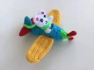 Finished crochet plane mobile with teddy bear landscape 1