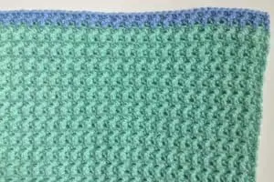 Crochet baby blanket 2 rows of blue