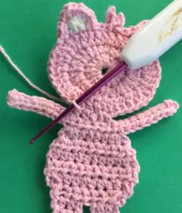 Crochet child teddy bear joining for neatening row