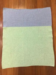 Finished crochet stroller baby blanket