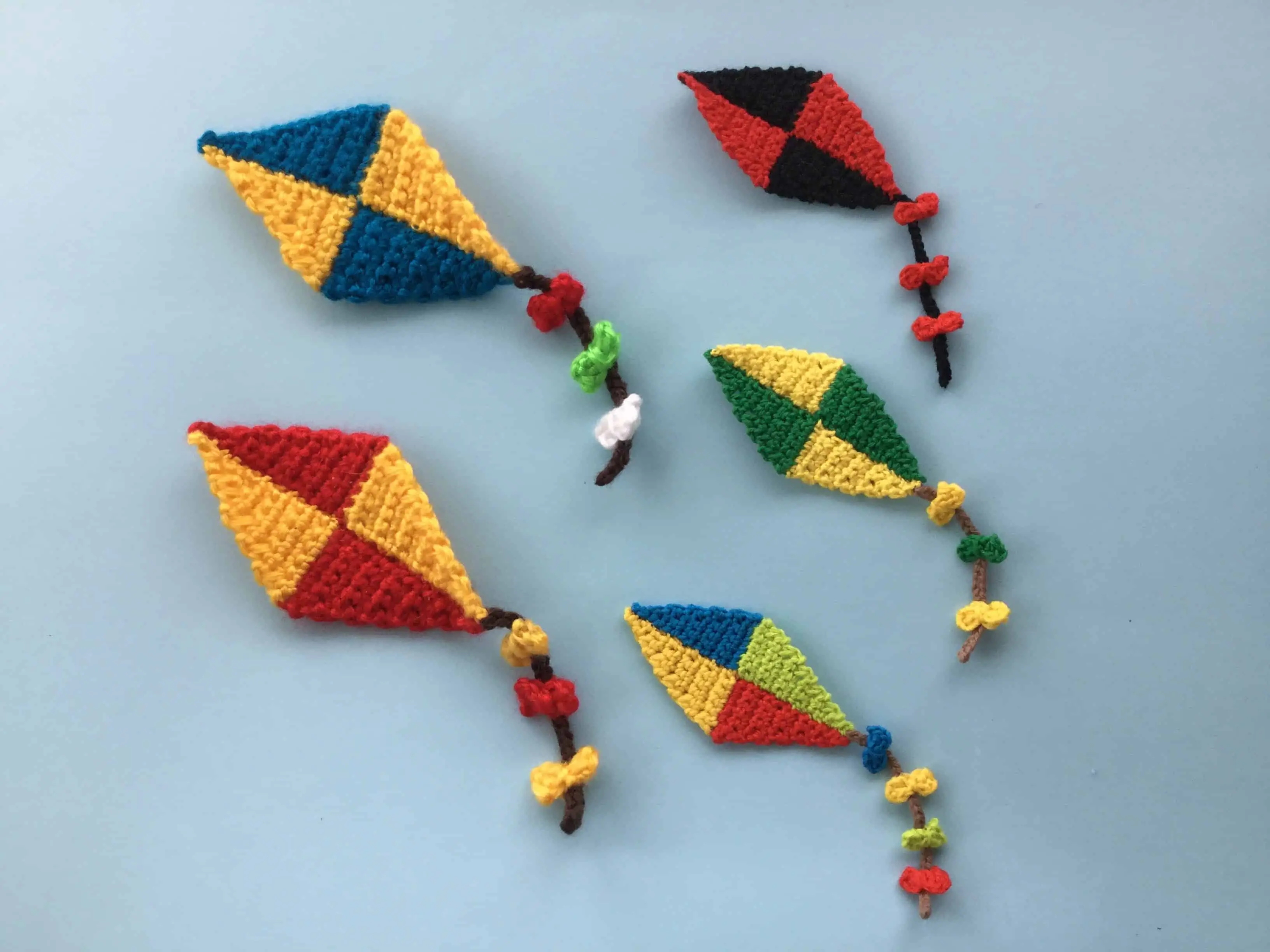 Finished crochet kite group landscape