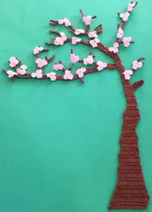 Crochet blossoms and swing tree with blossoms