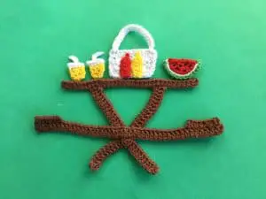 Finished crochet picnic food on table landscape