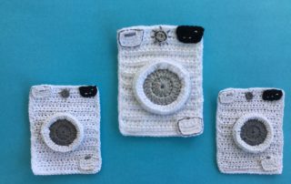 Finished crochet washing machine group blue background landscape